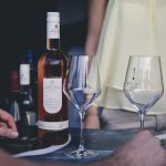 Food And Wine Festival - person holding clear wine glass