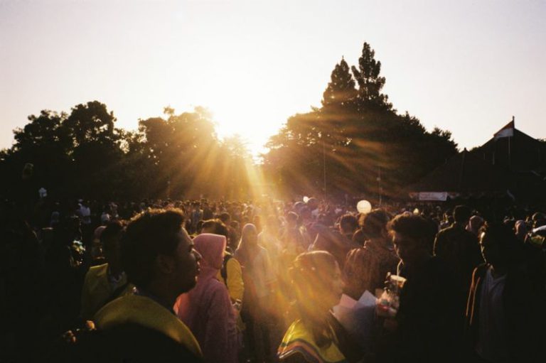 Film Festival - a crowd of people standing around each other