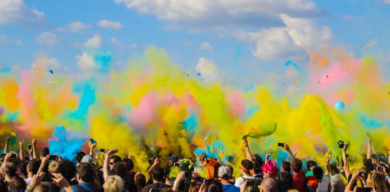 Literary Festival - group of people celebrating powder festival outdoors