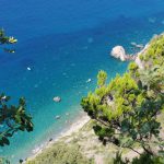 Exotic B&B - aerial photography of body of water and mountains