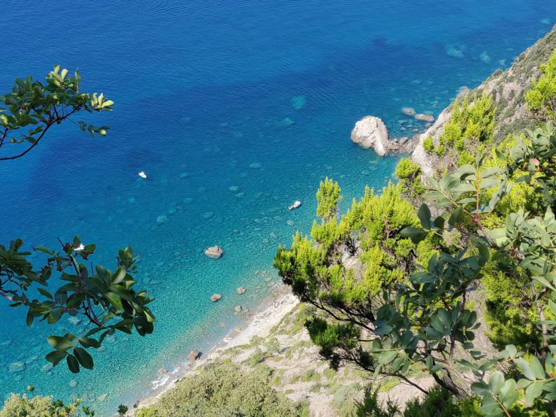 Exotic B&B - aerial photography of body of water and mountains