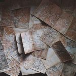 Travel Scams - maps lying on the floor