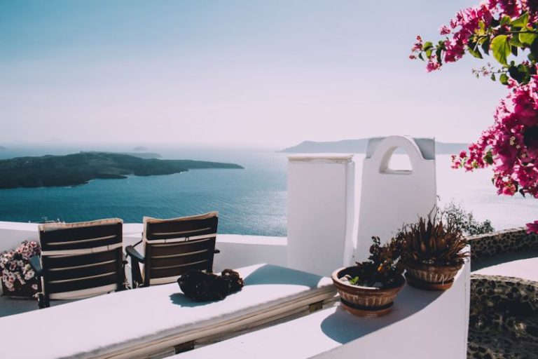Unique Luxury Features - two brown wooden chairs beside the wall