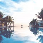 Honeymoon Luxury B&B - two person standing beside swimming pool