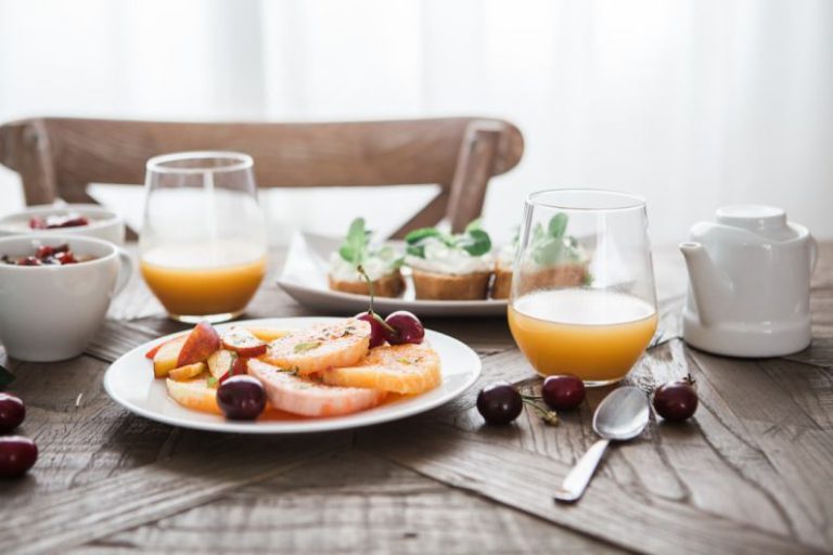 Bed And Breakfast Exterior - slice fruits on plate on near glass cups