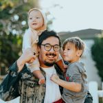 Family-friendly Bed And Breakfast - man in white shirt carrying girl in gray shirt