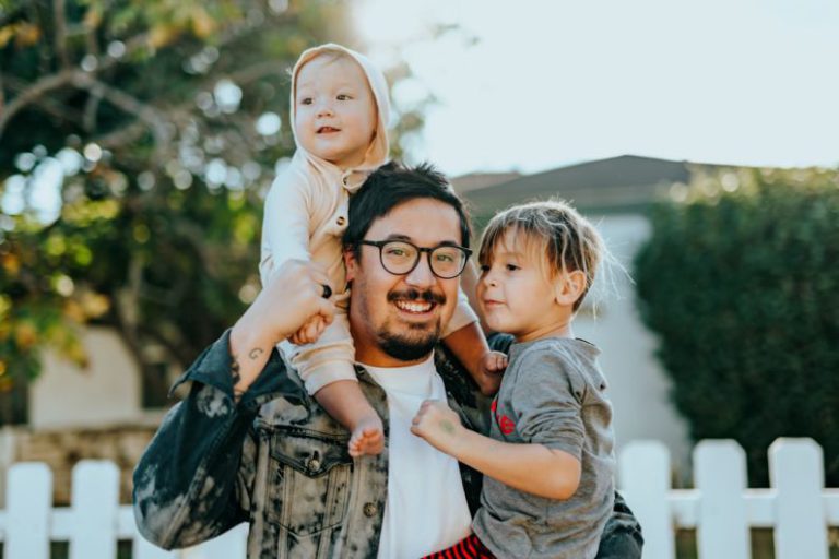 Family-friendly Bed And Breakfast - man in white shirt carrying girl in gray shirt