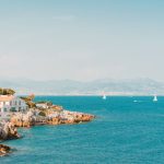 South Of France - white and brown rock formation on sea under blue sky during daytime