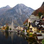 Austrian Village - city beside body of water during daytime