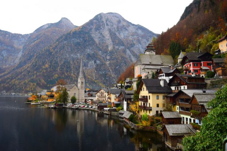 Austrian Village - city beside body of water during daytime