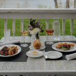 Gourmet Meal - a table that has plates of food on it