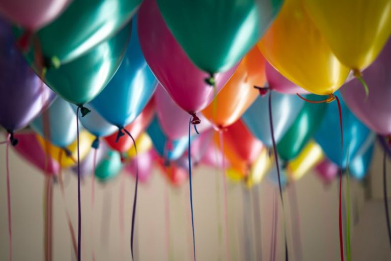 Birthday Celebration - selective focus photography of assorted-color balloons