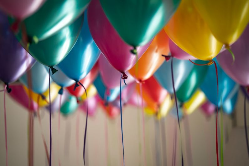 Birthday Celebration - selective focus photography of assorted-color balloons