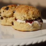 Scones - brown bread on white ceramic plate
