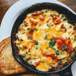 Breakfast Casserole - omelette on black plate