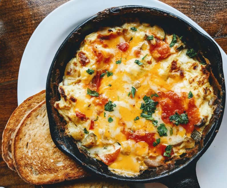 Breakfast Casserole - omelette on black plate