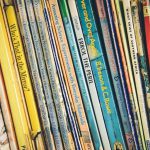 Owner Stories - pile of assorted-title books